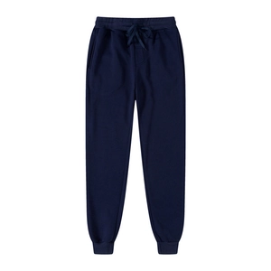 Detail of navy blue fleece joggers featuring elastic drawstring waist and ribbed cuffs