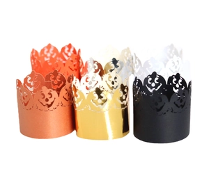 Laser-cut Halloween pumpkin paper lamp shades and LED candle wraps in multiple colors