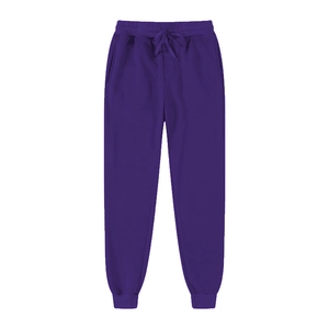 Detail view of deep purple joggers with drawstring waistband and ribbed ankle cuffs