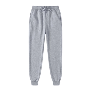Detail of light gray joggers featuring elastic waistband with drawstring and side pockets