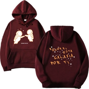 Detailed front and back view of burgundy hoodie featuring astronaut print and spanish text