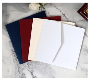 Macro shot of elegant pearlescent business invitation envelopes in four classic colors