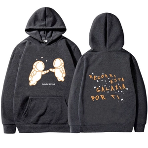 Front and back detail of grey hoodie with cartoon astronaut print and Spanish text