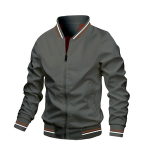Macro detail of ribbed baseball collar and red inner lining on a grey bomber jacket