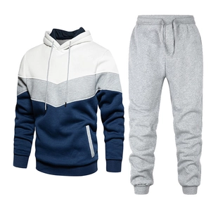 Men's two-piece tracksuit featuring a tri-color hooded sweatshirt and grey joggers