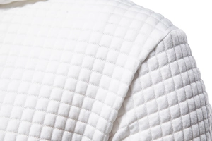 Detailed close-up of white long sleeve hoodie featuring premium 3D square quilted fabric texture