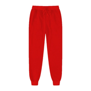 Detail of red joggers with adjustable drawstring waistband and ribbed ankle cuffs