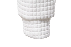 Close-up of white men's hoodie showing premium waffle texture and ribbed knit cuffs