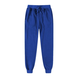 Detail of royal blue sweatpants showing elastic drawstring waist and side pockets