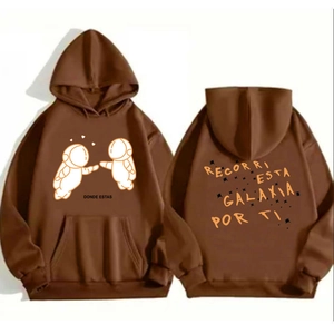 Front and back view of brown hoodie with astronaut print and Spanish typography