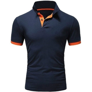 Detail of navy blue polo shirt with vibrant orange contrast stitching on the collar and placket