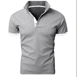 Detailed view of grey short-sleeve polo shirt with white trim and ribbed collar details