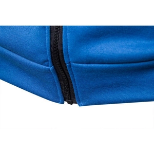 Detailed close-up of high-quality zipper and stitching on navy blue knitted hoodie hem
