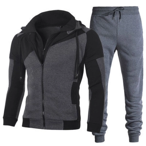Men's two-piece tracksuit featuring grey and black zip-up hoodie and matching joggers