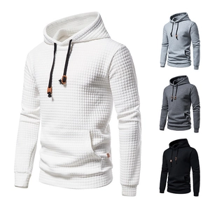 Men's white quilted waffle hoodie with black drawstrings and classic kangaroo pocket