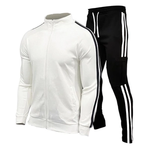 Detail of men's casual tracksuit featuring white zip-up jacket and black cargo joggers