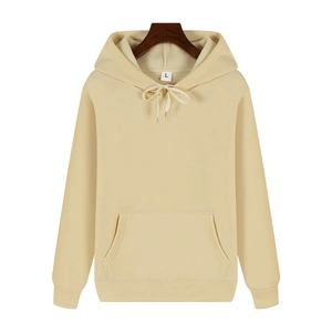 Detail of light beige hoodie showing the drawstring hood, kangaroo pocket, and ribbed cuffs