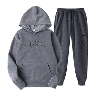 Dark grey tracksuit with hoodie and sweatpants featuring heartbeat graphic print
