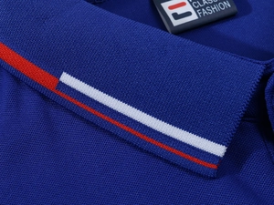 Detailed close-up of a navy polo shirt collar with red and white striped ribbed edges