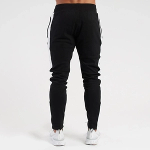 Slim fit black men's joggers featuring side white stripes and tapered cuffs back view