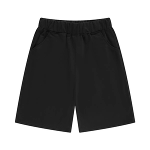 Detail view of black kids sports shorts showing elastic waistband and side pockets