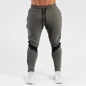 Slim fit men's dark grey jogger pants with black contrast panels and drawstring