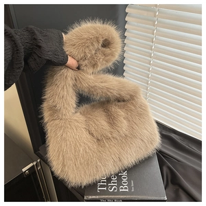 Detail of the high-quality khaki faux fur tote bag showing thick plush texture and handle