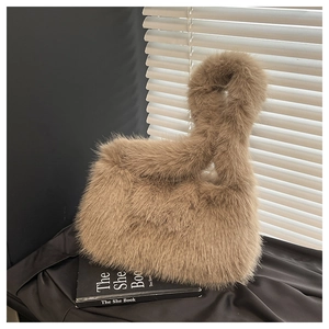 Detailed texture of the khaki faux fur tote bag showing plush and soft winter material