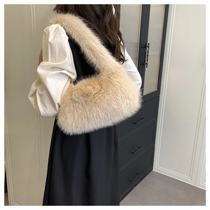 Close-up of fluffy faux fur tote bag showing soft texture and beige plush material