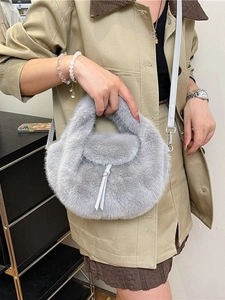 Stylish gray faux fur crossbody bag for women with plush texture and adjustable strap