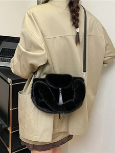 Chic black faux fur crossbody bag for women with leather drawstring and shoulder strap