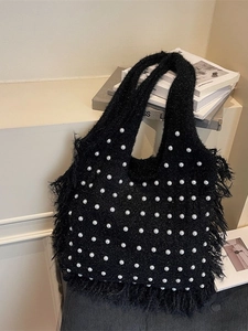 Large black knitted tote bag with white pearl accents and fringe detail for women