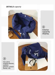 Detail view of large canvas tote bag showing interior capacity and zipper pocket