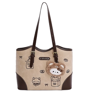 Chic beige and brown tote bag with cute cat patterns and a plush bear charm for women