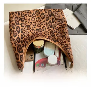 Detail showing the large interior capacity of this leopard print hobo shoulder bag