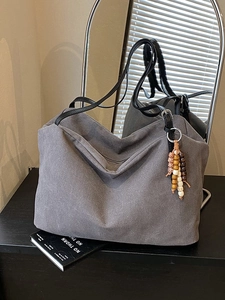 Retro large capacity grey tote bag with black leather straps and wooden bead charm