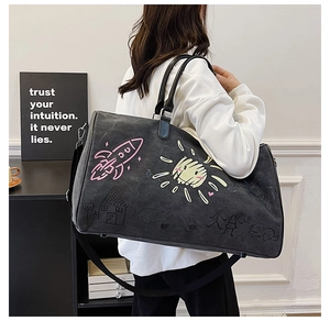 Modern graffiti travel bag featuring colorful prints and versatile shoulder strap