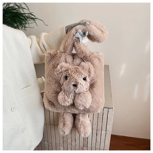 Close-up of soft brown plush teddy bear tote bag with high-density faux fur texture