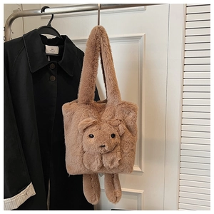 Detail of plush brown teddy bear tote bag with 3D cartoon head and dangling doll legs
