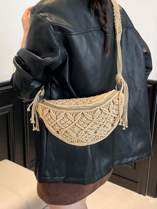 Bohemian cream macrame crescent crossbody bag with woven diamond patterns and tassels