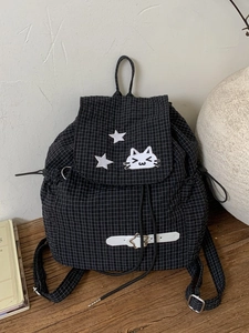 Black and white checkered backpack with cat embroidery and star drawstring straps