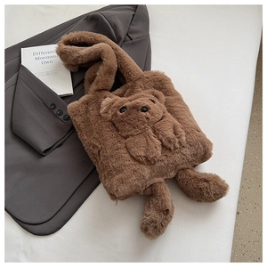 Detail of plush tote bag showing 3D teddy bear design on soft faux fur surface