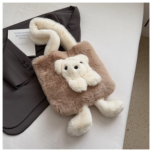 Detailed macro view showing the soft brown and beige faux fur texture on teddy bear tote bag