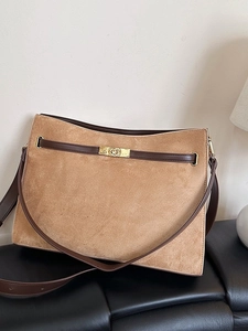 Vintage brown suede shoulder bag with contrast leather trim and golden metal turn-lock