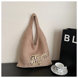 Detail of coffee knit tote bag with leopard print Mama letter patch embroidery