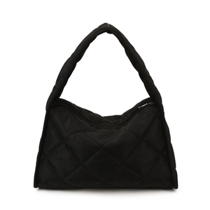 Black quilted puffer shoulder bag with minimalist diamond stitching and zip closure