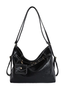 Sac hobo noir vintage avec surpiqûres blanches contrastées et petite pochette