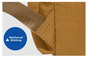 Detail der Riegelverstärkung am braunen Nylon-Rucksackgurt für verbesserte Haltbarkeit