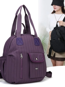 Quilted waterproof nylon travel backpack with large capacity in purple and black
