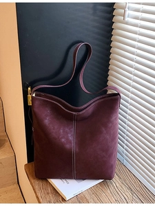 Burgundy faux suede tote bag with white contrast stitching and large capacity